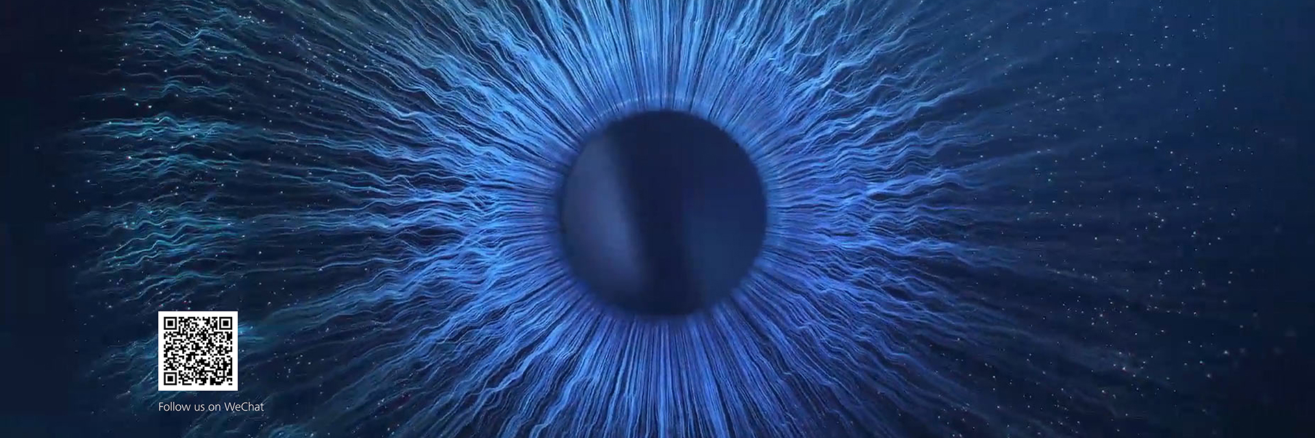 Challenge the Limits of Imagination motion - a close up of a blue eyeball in the dark.