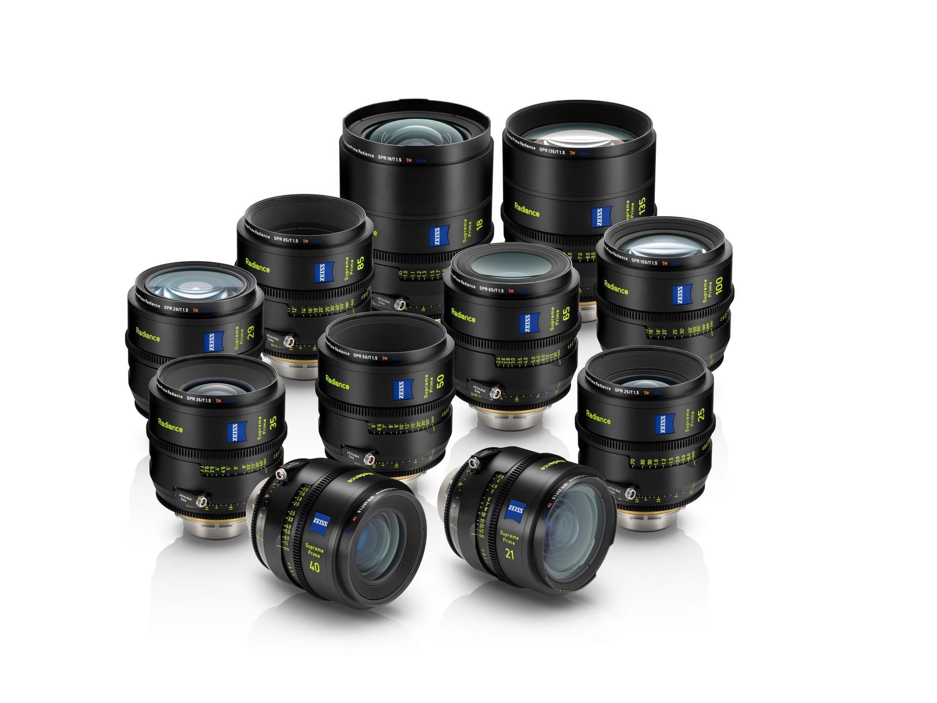 A collection of eleven professional ZEISS camera lenses arranged in rows on a white background.