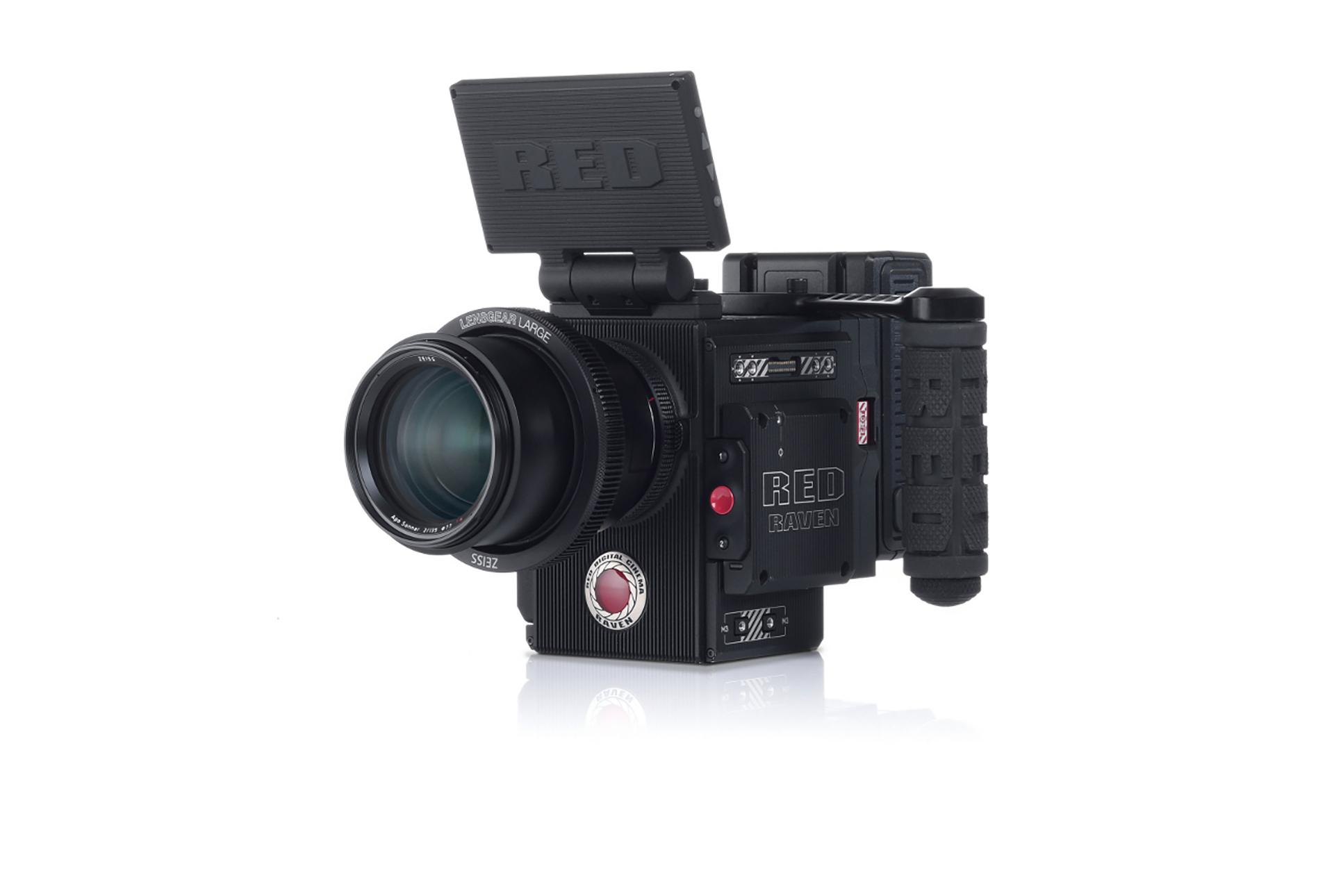 Professional cinema camera equipped with a ZEISS lens, featuring a mounted display screen and ergonomic side handle.