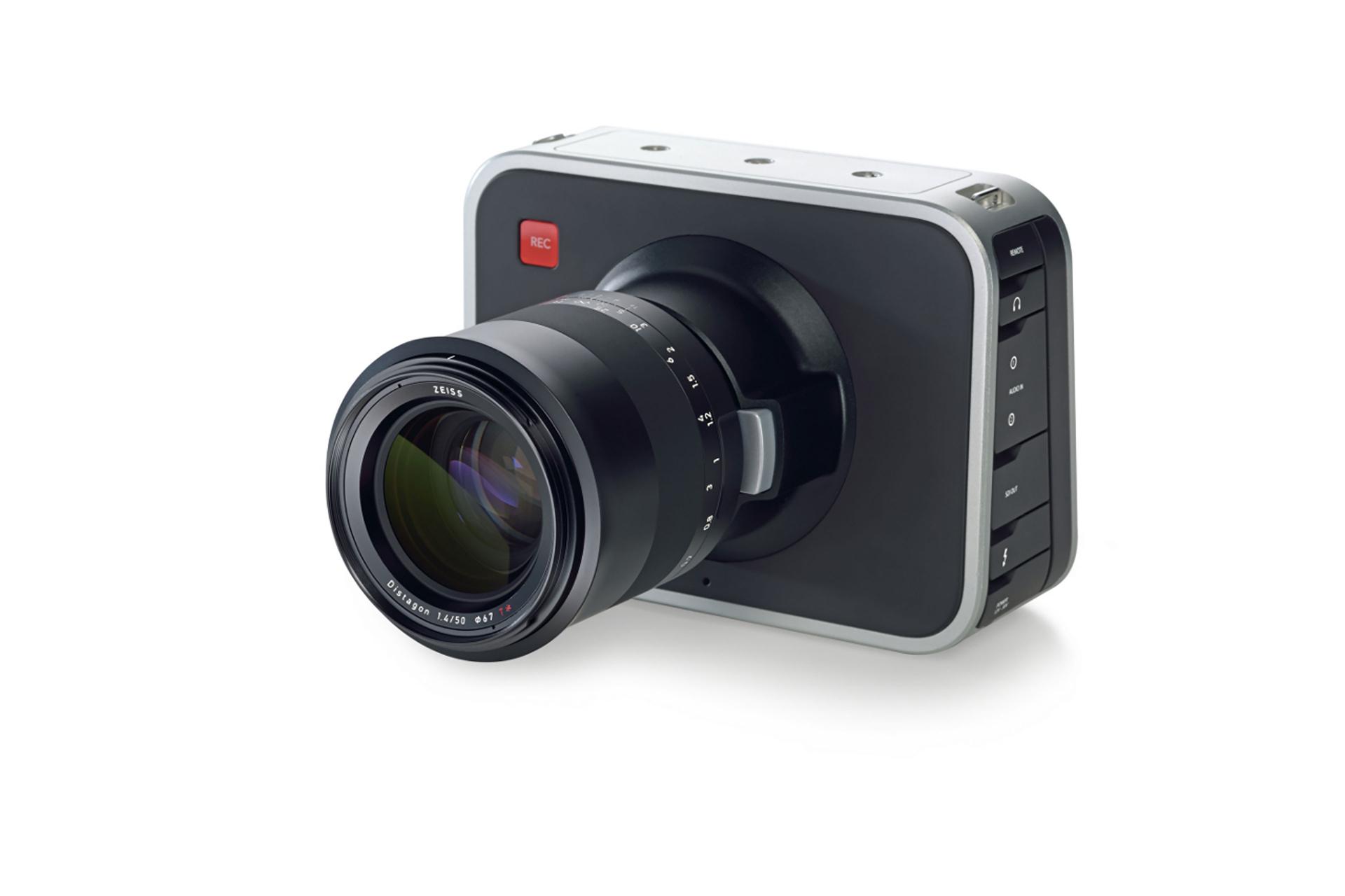 Digital cinema camera equipped with a ZEISS lens, featuring a large display and side control buttons.