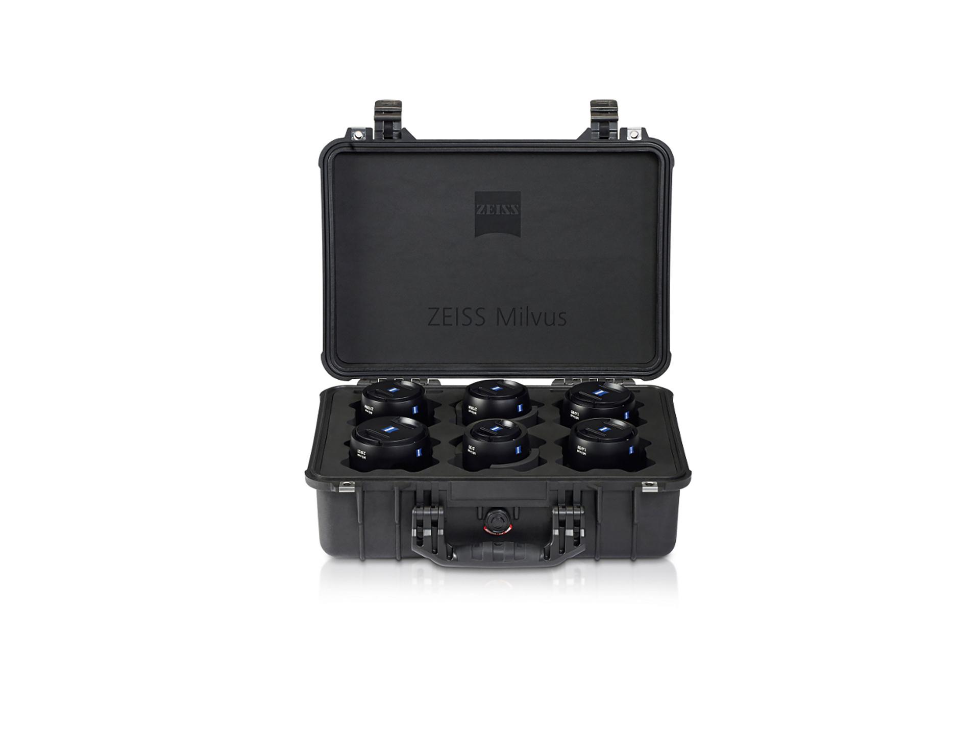 Black hard case with ZEISS branding, opened to display six ZEISS Milvus camera lenses securely arranged inside.