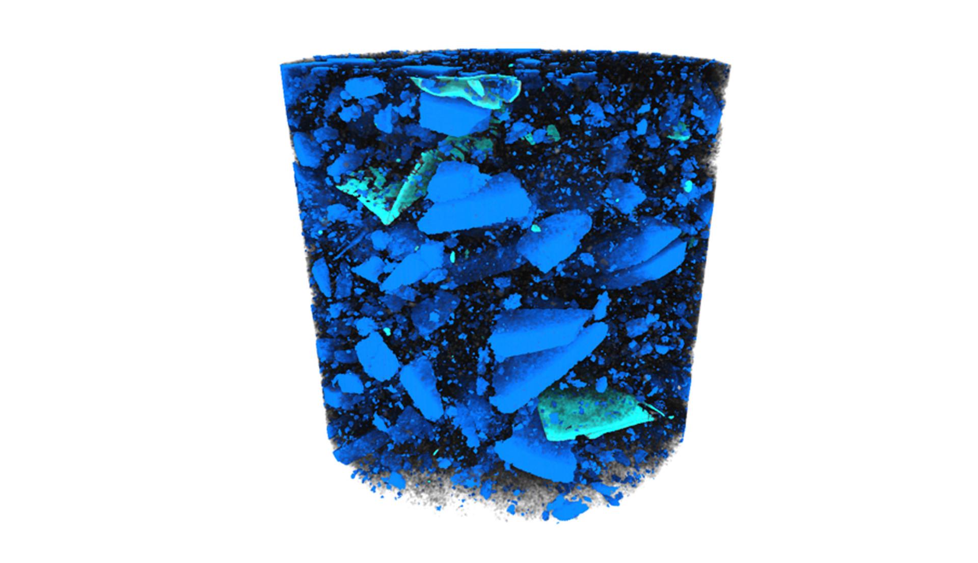 黑块中材料的三维体积，黑块是回收电池粉碎后产生的粉末。使用Mineralogic 3D对正极颗粒（蓝色）和残留箔片（绿松石色）单独分割，以进行量化和分析。