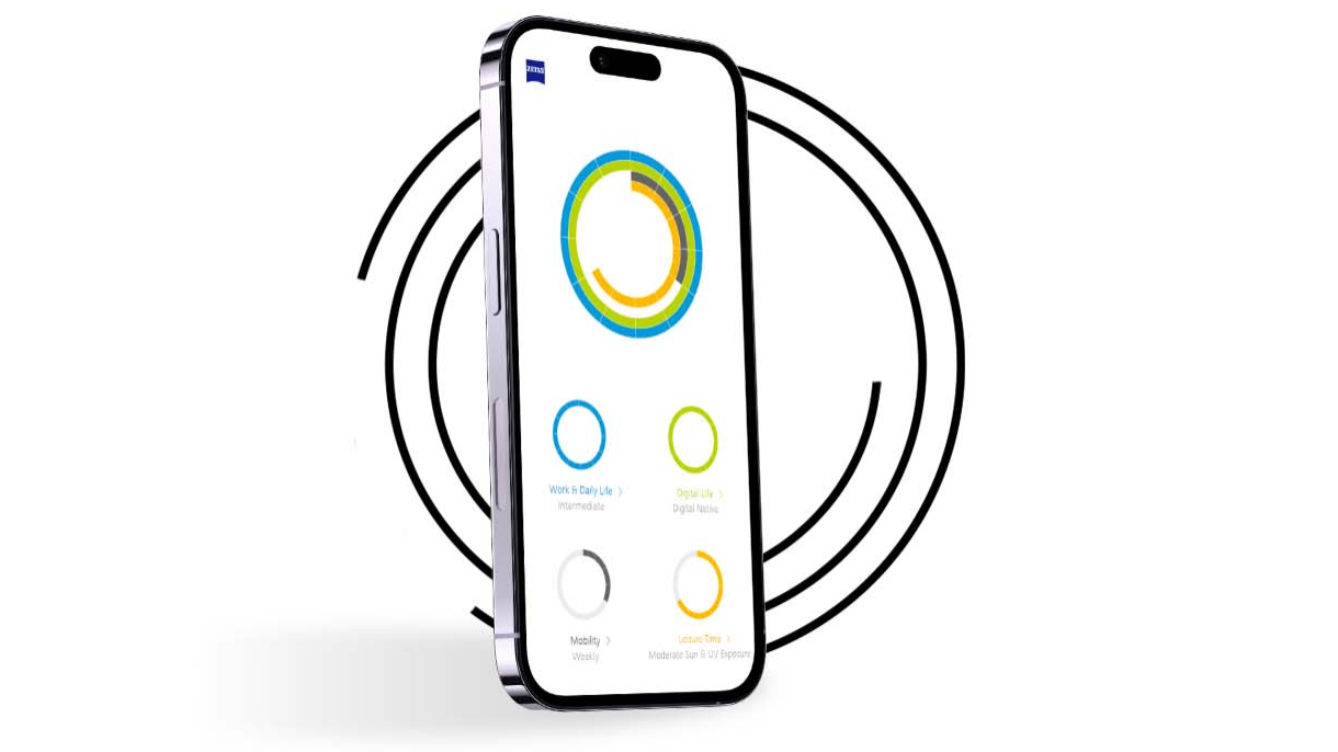 一部智能手机被置于多个黑色环形物前，显示出用户的视觉状况，这些环形物上呈现出各种不同的颜色。 
