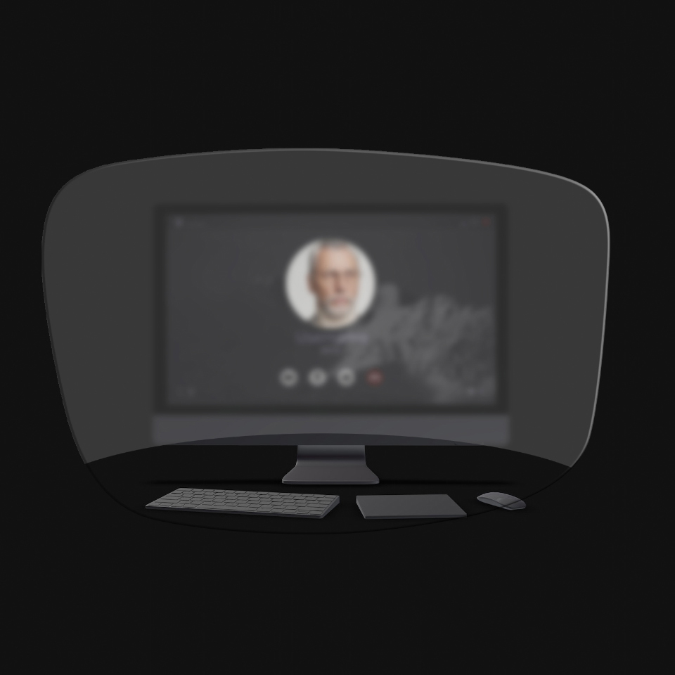 从老花镜中看台式电脑，键盘、鼠标和书本的示意插图，图片中仅最近处的物体可以被清楚地看到。电脑屏幕是模糊的。