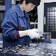 The picture shows an employee of Wuxi Maytag Machinery Co Ltd.